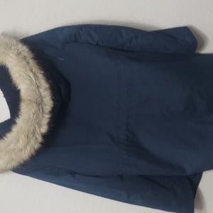 Like new women's coat still has the tags on it